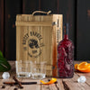Rusty Barrel Spiced Rum bottle and Gift Box with cocktail glasses on a wooden surface with a rustic background