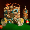 Rusty Barrel Vodka bottle and packaging with decorative skull design on a pool table.
