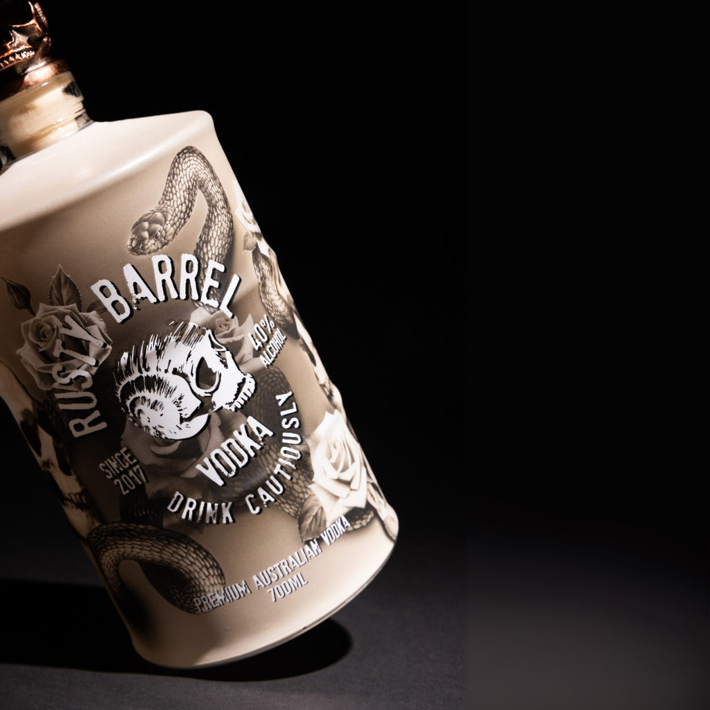 Rusty Barrel Vodka bottle 700ml Bondi Ink with snake design on a black background