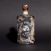 Bottle of Rusty Barrel Vodka 700ml Tattoo Deadmind with a skull design on a dark background