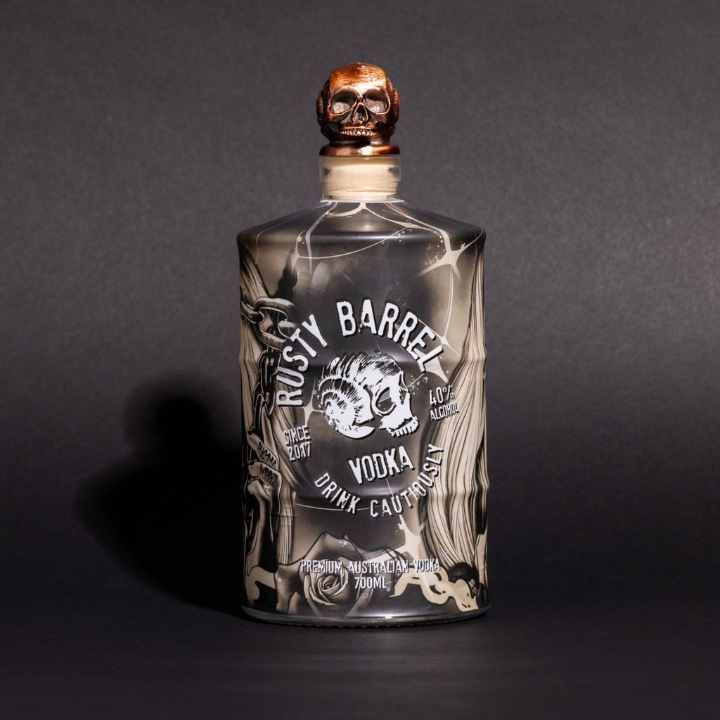 Bottle of Rusty Barrel Vodka 700ml Tattoo Deadmind with a skull design on a dark background